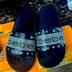 Clear diamond strapped / Black Sole  , BEBE SLIDES. Great condition!
